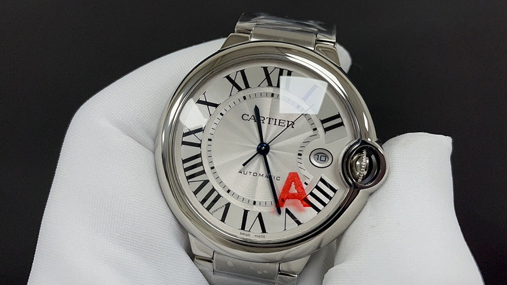 Cartier watch dial front view in silver with Roman numerals, blue hands, red A mark