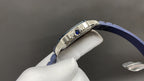 Cartier watch clasp with silver buckle and blue leather strap