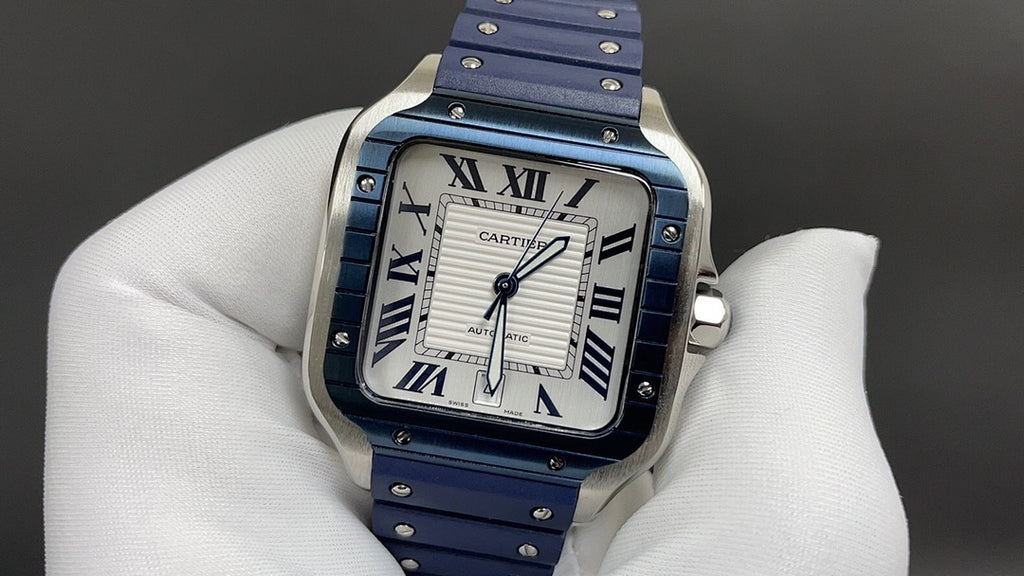 Cartier square watch with blue leather strap and silver case, Roman numeral white dial