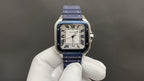 Cartier square watch with blue leather strap and silver case, Roman numeral white dial front