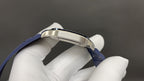 Cartier watch stainless steel case and blue leather strap close-up on white glove