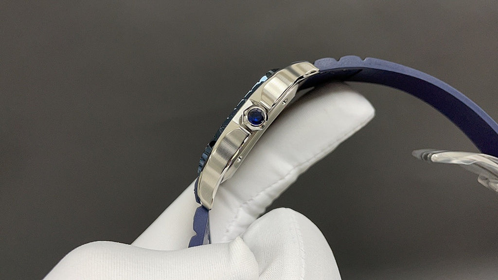 Cartier watch side view with crown and blue leather strap on white glove