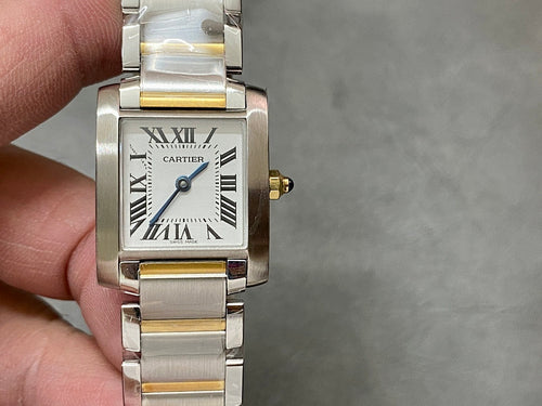 Two-tone wristwatch with rectangular case, white dial Roman numerals, blue center hand