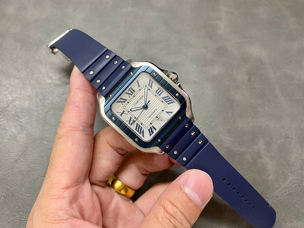 Cartier blue leather wristwatch with roman numeral dial and steel case