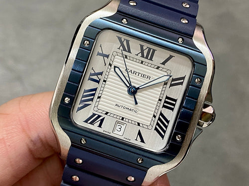 Cartier blue leather watch, roman numeral dial with automatic, steel case