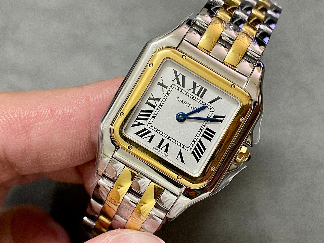 Cartier watch angled front view with gold bezel and roman numeral dial