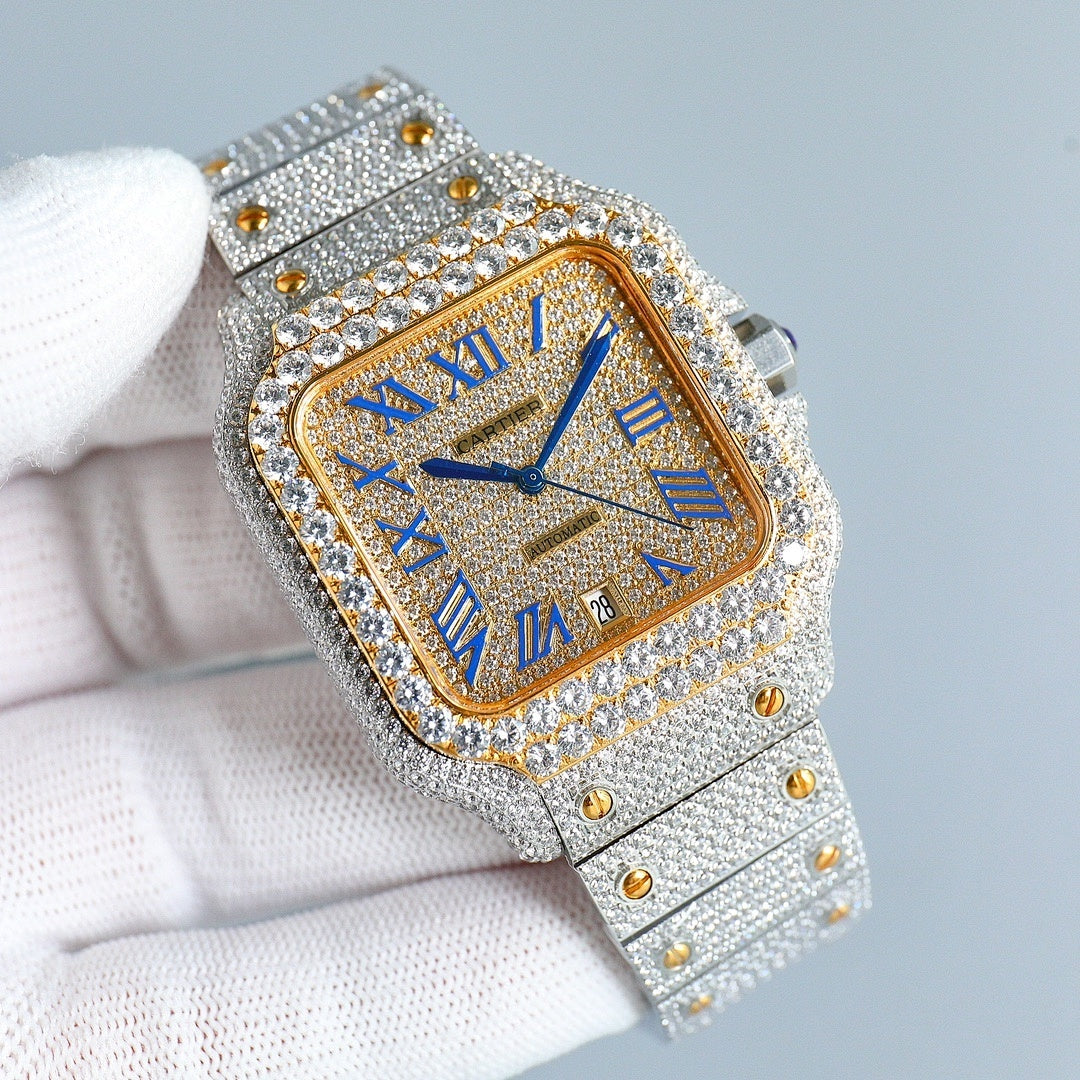 Rectangular diamond wristwatch with gold face, Roman numerals, blue hands on silver strap