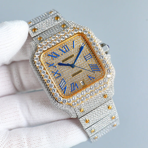 Rectangular diamond wristwatch with gold face, Roman numerals, blue hands on silver strap
