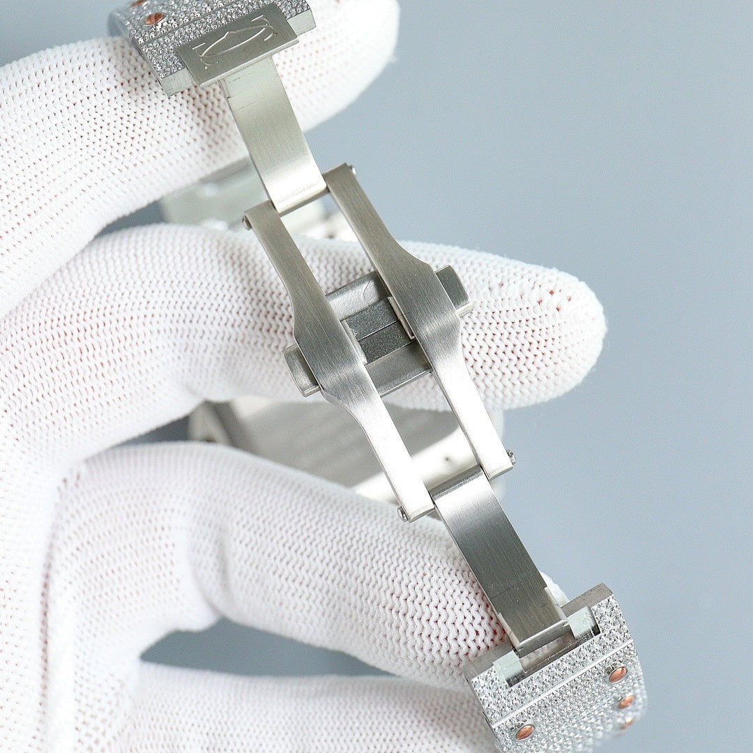 Cartier watch underside, metal case and clasp, jeweled silver link bracelet.