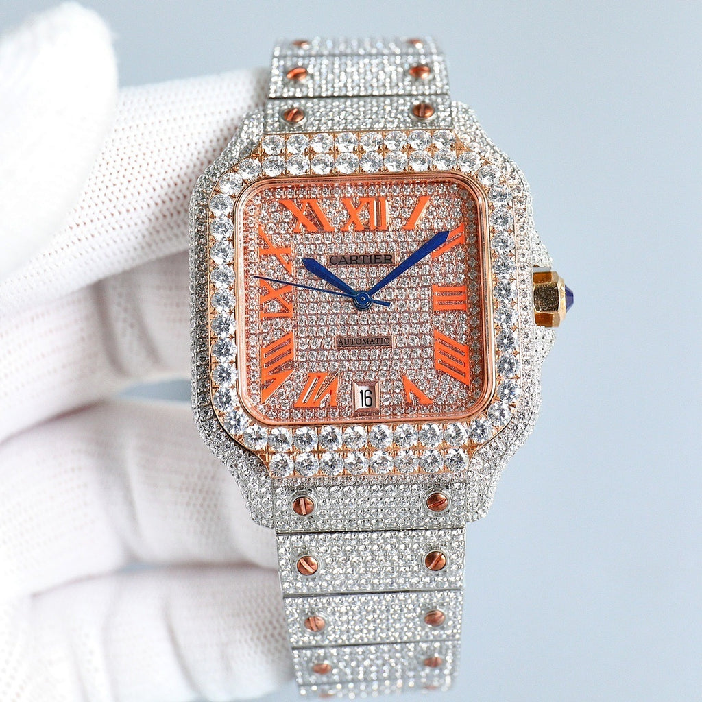 Cartier watch front view, rose-gold dial, blue hands, diamond bezel, silver bracelet.