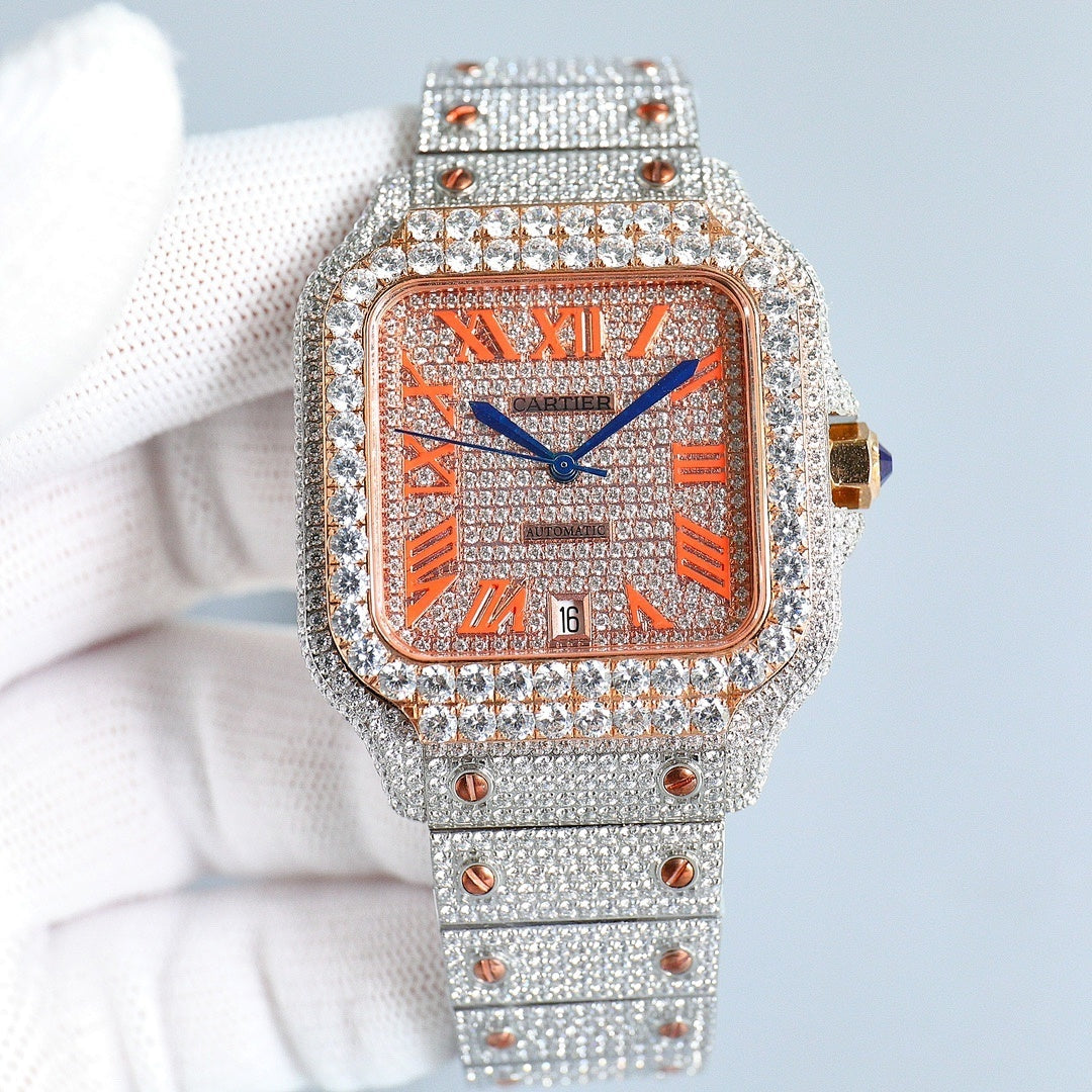 Cartier watch front view, rose-gold dial, blue hands, diamond bezel, silver bracelet.