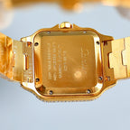 Cartier gold wristwatch case back with engraved markings and metal clasp links