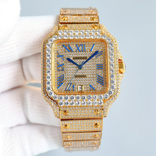 Cartier diamond bezel square wristwatch with blue Roman numerals, blue hands, gold bracelet