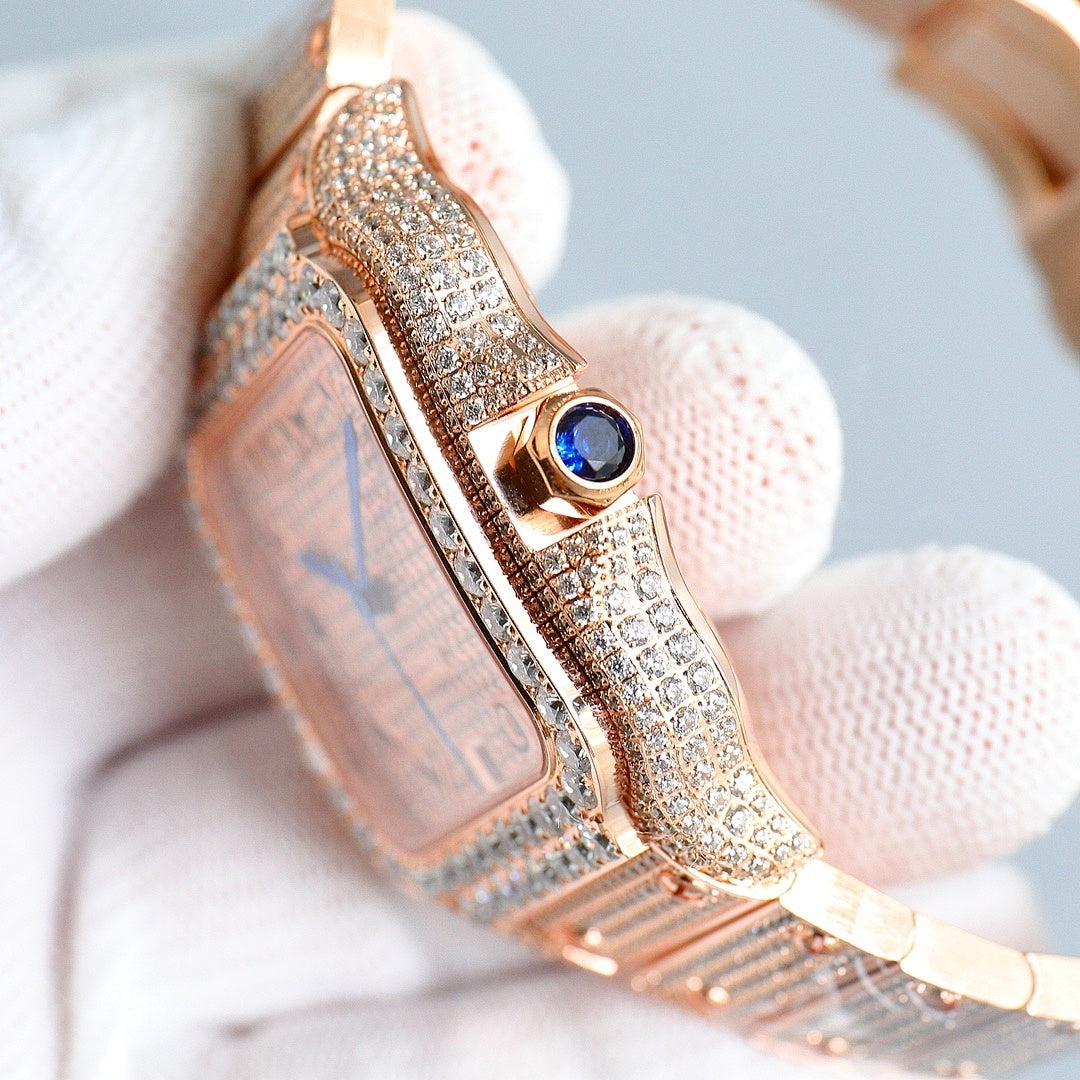 Cartier rose-gold diamond watch side view with blue gemstone accent near bezel
