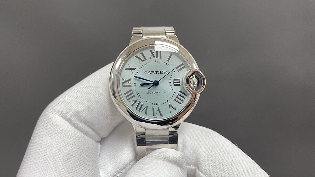 Cartier automatic wristwatch with silver dial and Roman numerals, steel bracelet