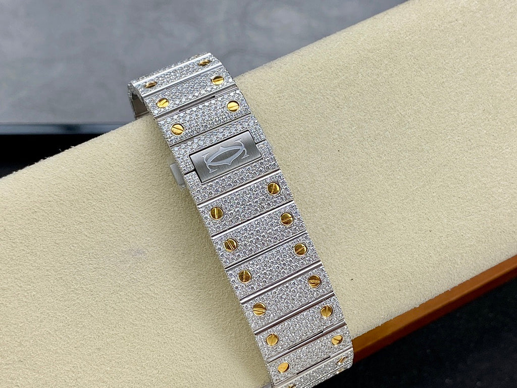 Silver diamond watch with gold stud details on bracelet and clasp