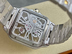 Exposed watch movement with silver bracelet and diamond studded bezel