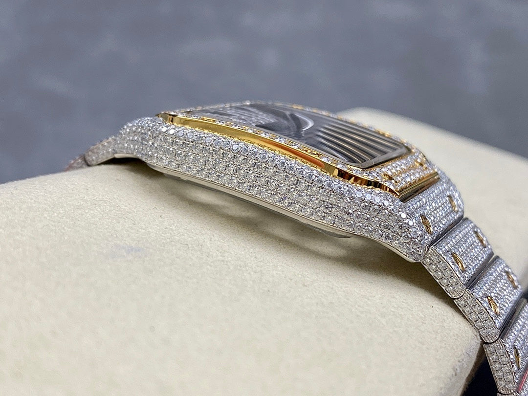 Diamond studded watch with gold-tone inner bezel and sparkling silver bracelet links