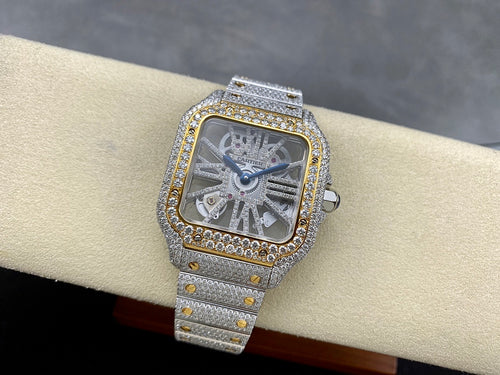 Diamond bezel square dial watch with silver strap and gold accents