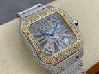Square diamond watch with silver bracelet, gold-trimmed bezel, and blue dial hands