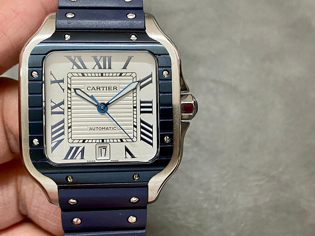 Cartier men’s watch with silver case, white face, Roman numerals, blue leather strap