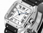 Cartier watch with black rubber strap, silver-toned square case, white dial and roman numerals.