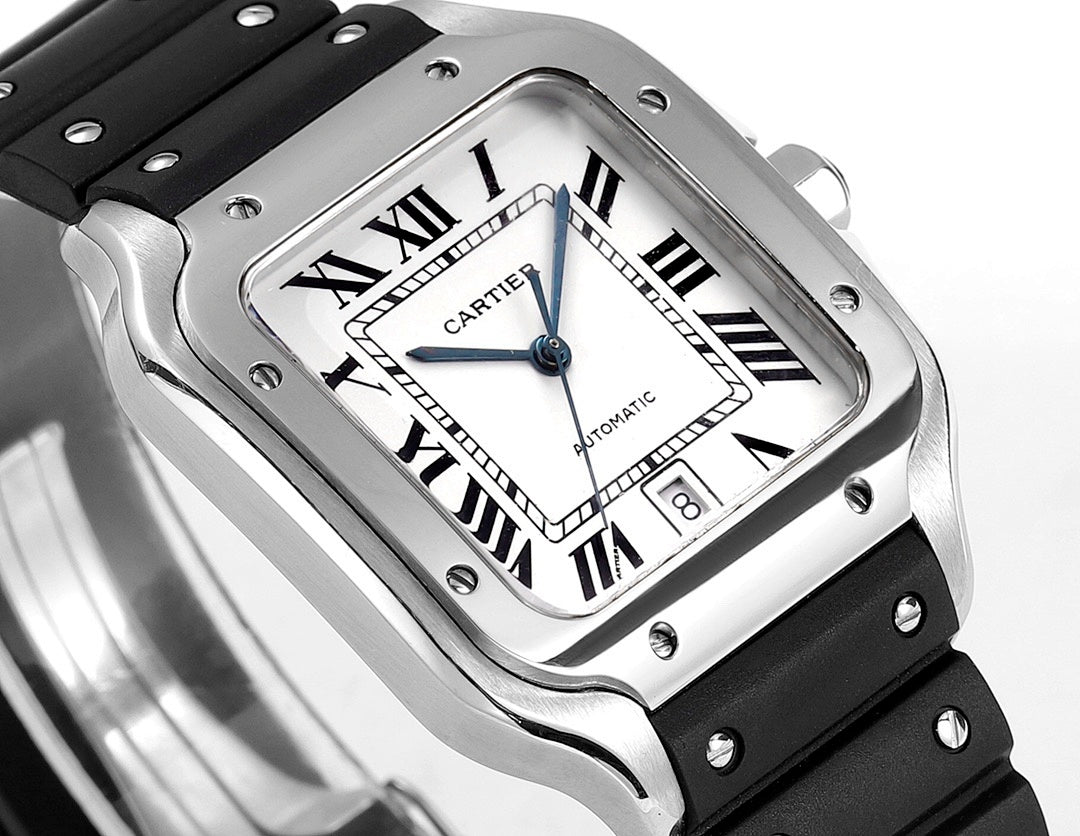 Cartier watch with black rubber strap, silver-toned case, white dial with blue hands.