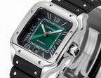 Cartier watch with black rubber strap, silver-toned square case, dark dial with green accents.