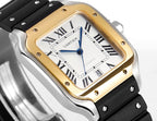 Cartier watch close-up with gold-tone case bezel, white Roman dial, blue hands, black strap.