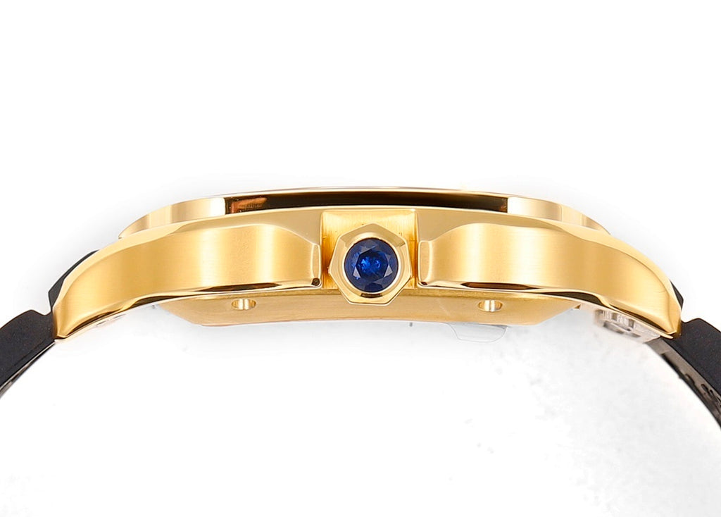 Cartier watch gold-tone bracelet case top with blue sapphire-style accent and black strap.