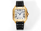 Cartier watch with black rubber strap and gold-tone square case, Roman dial and blue hands.