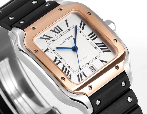 Cartier watch close-up with rose gold bezel, blue dial, black rubber strap