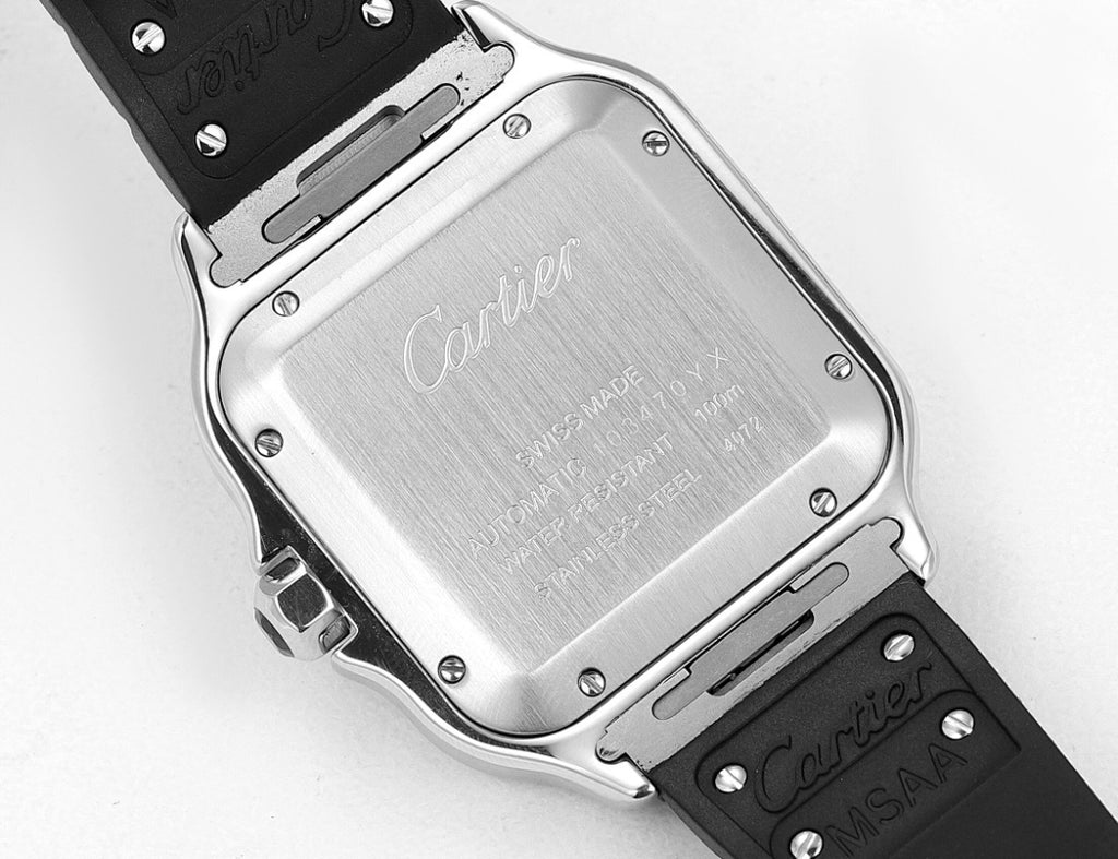 Cartier watch backplate with engraved markings, black rubber strap