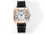 Cartier watch with white Roman numeral dial, black rubber strap, rose gold case