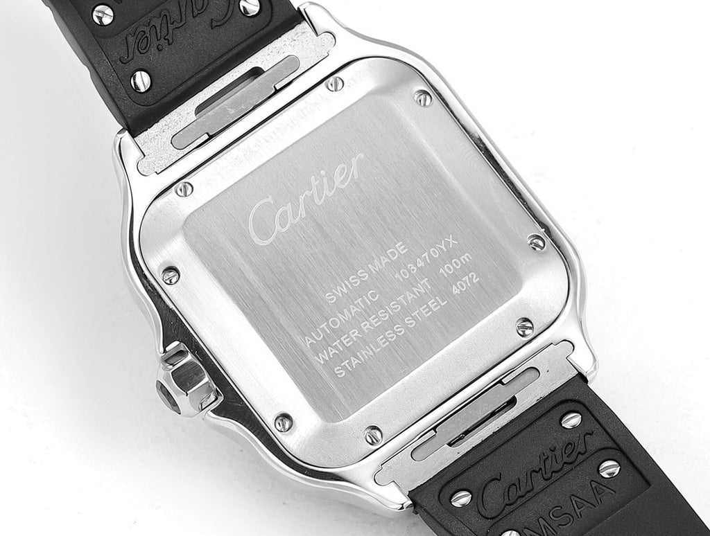 Cartier Santos watch case back, silver panel with engraved text, black rubber strap