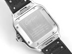 Cartier Santos watch case back, silver panel with engraved text, black rubber strap