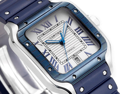 Cartier watch close-up: blue case bezel, white dial with Roman numerals and hands