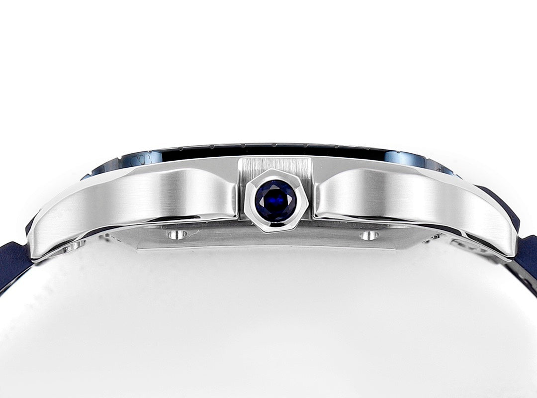 Cartier watch with silver case and blue cabochon crown, blue strap
