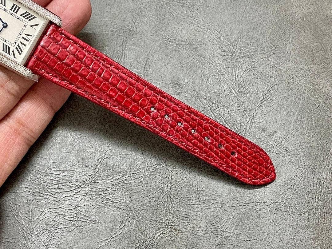 Cartier watch red crocodile leather strap end with textured pattern and stitch holes