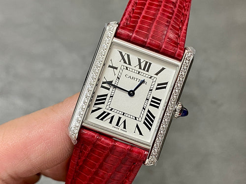 Cartier watch with red crocodile leather strap and silver square dial with Roman numerals