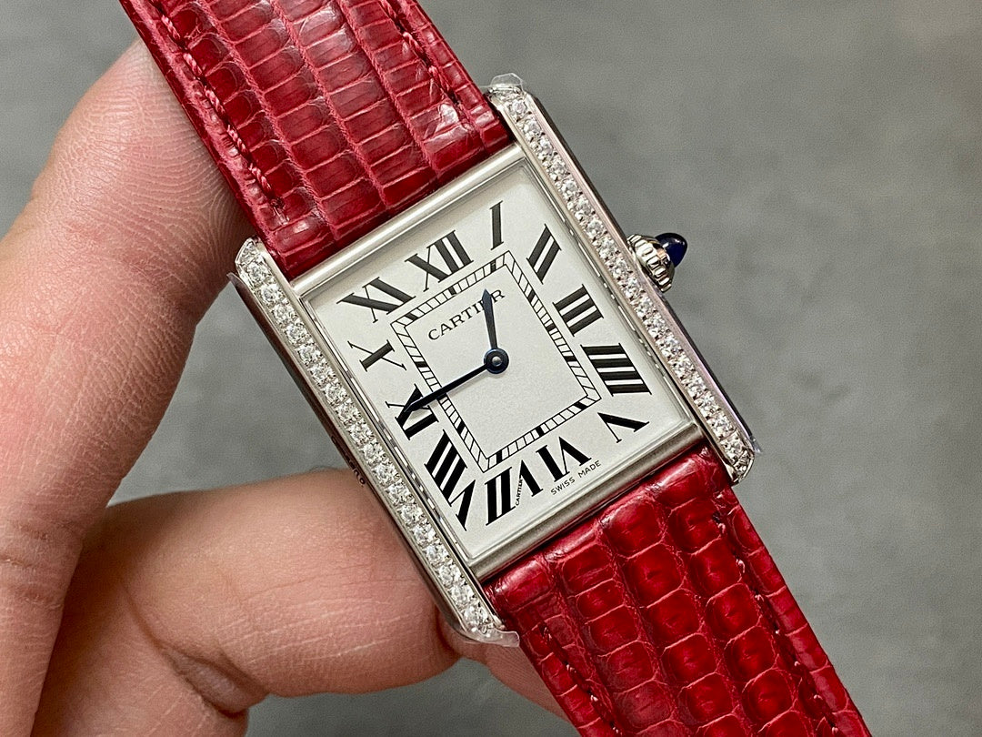Cartier watch front angle with red crocodile leather strap and jeweled silver bezel