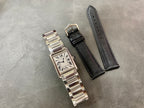 Rectangular stainless steel wristwatch with Roman numeral dial plus two black leather straps