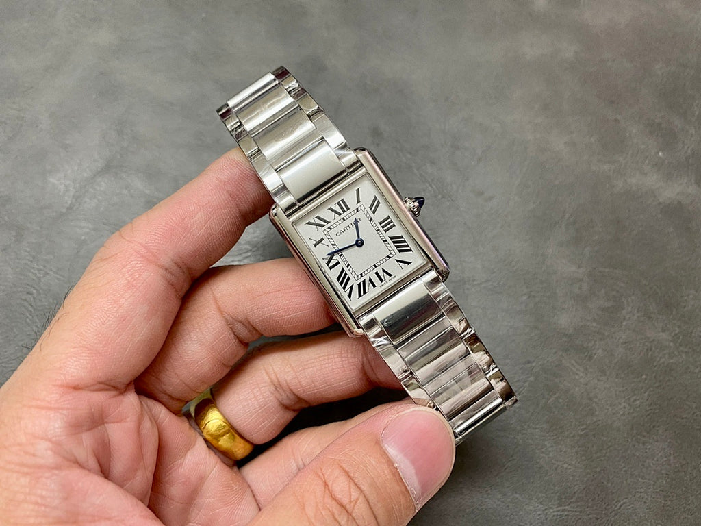 Rectangular stainless steel wristwatch with Roman numeral dial and blue hands