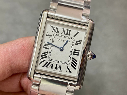 Rectangular stainless steel wristwatch with Roman numeral dial and blue hands
