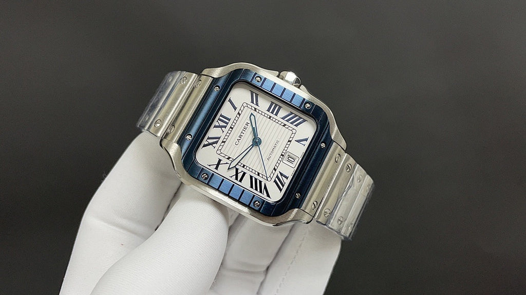 Cartier watch angled view, blue dial Roman numerals, stainless steel bracelet
