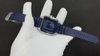 Blue strap Cartier watch with square case, full band shown with clasp end