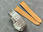 Cartier rectangular watch with metal bracelet and tan leather strap pieces