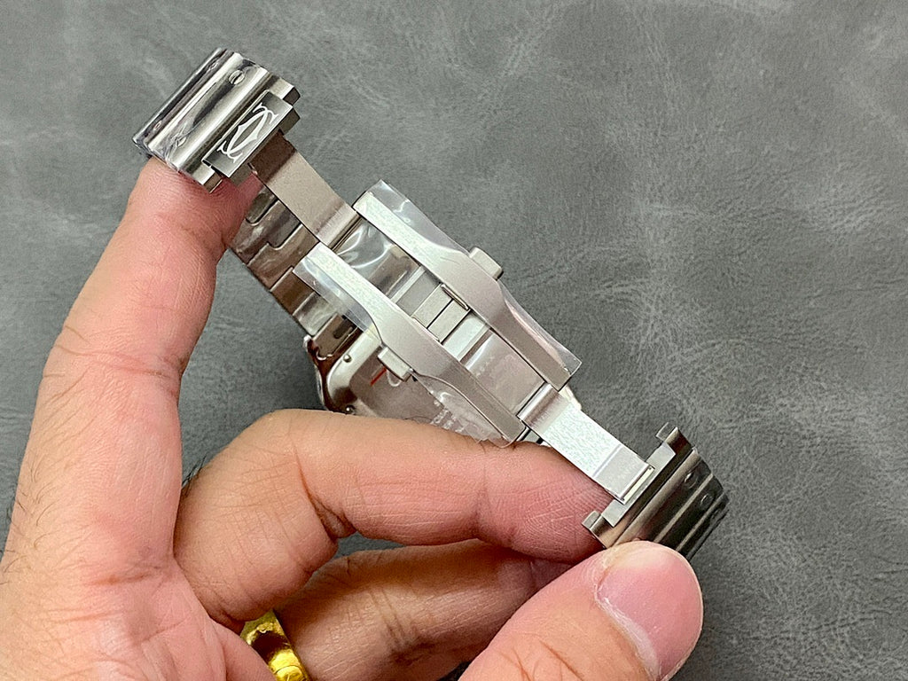Silver Cartier watch strap links and clasp, side view