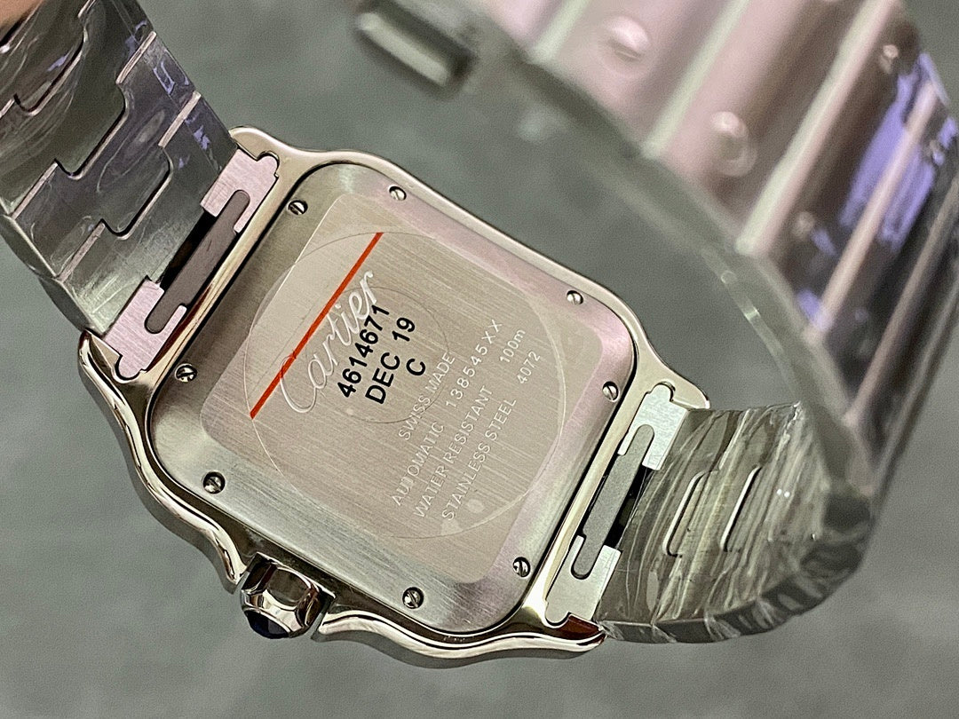 Silver watch case back with engraved markings and date window