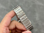 Cartier Santos watch back view with silver metal bracelet